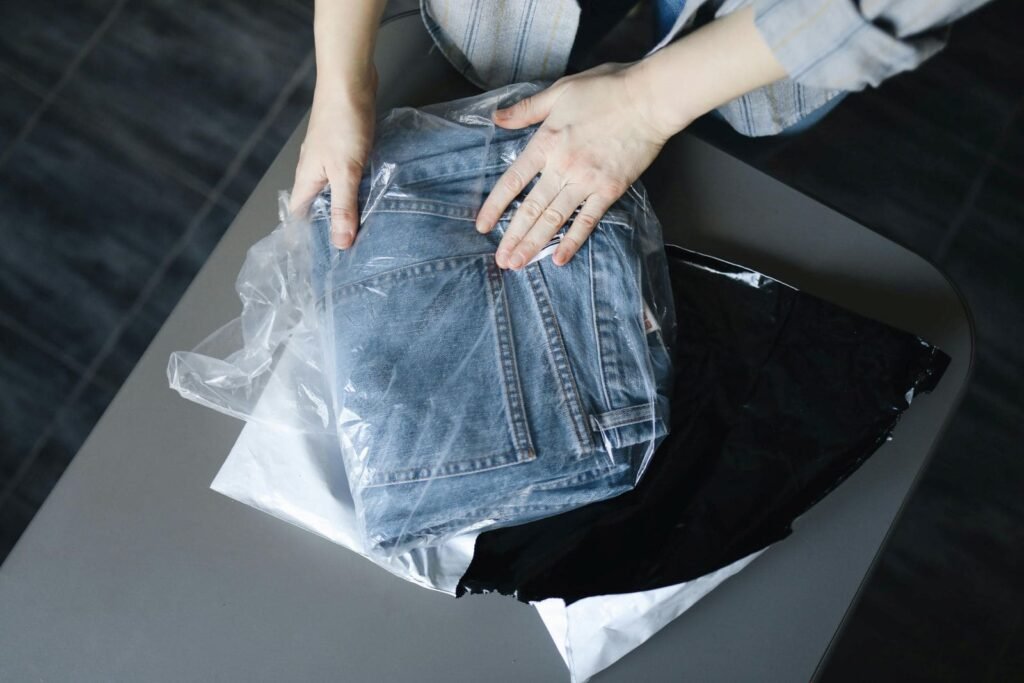Manual clothing packaging process compared with bagging machine packaging