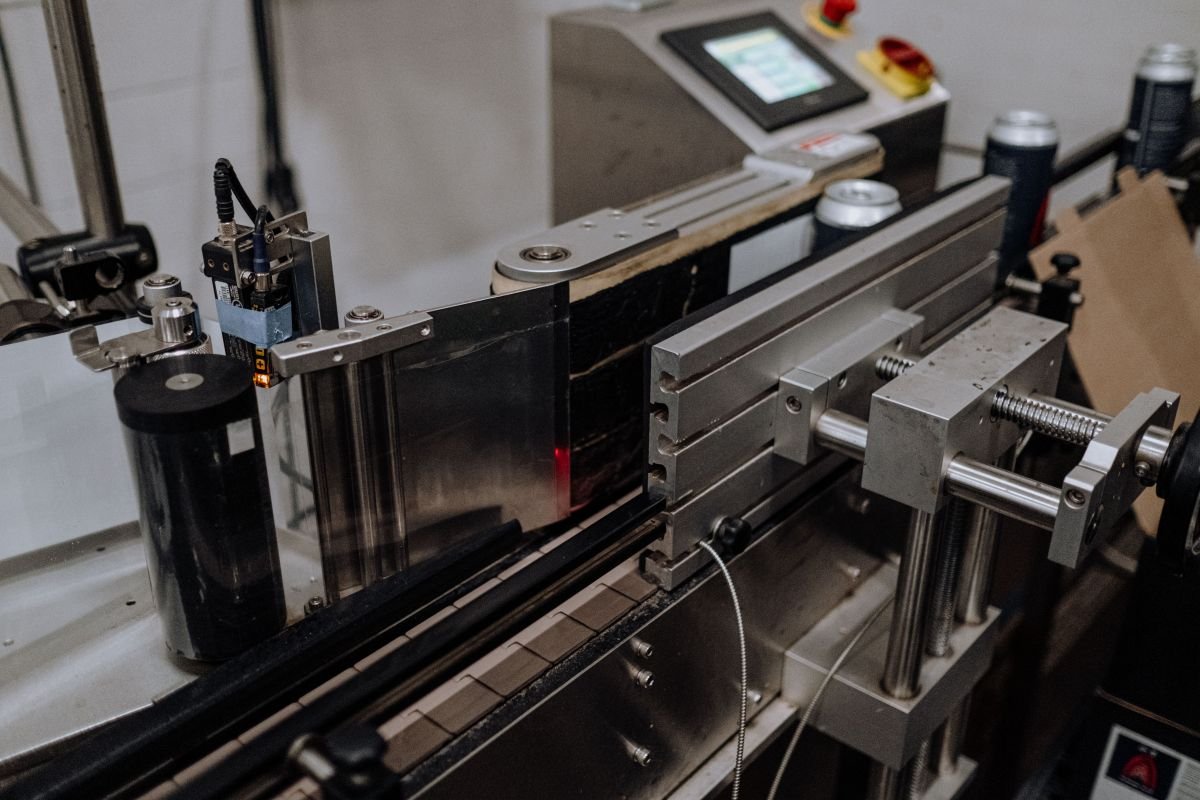 Close-up of machine sensors and components used to evaluate packaging equipment quality