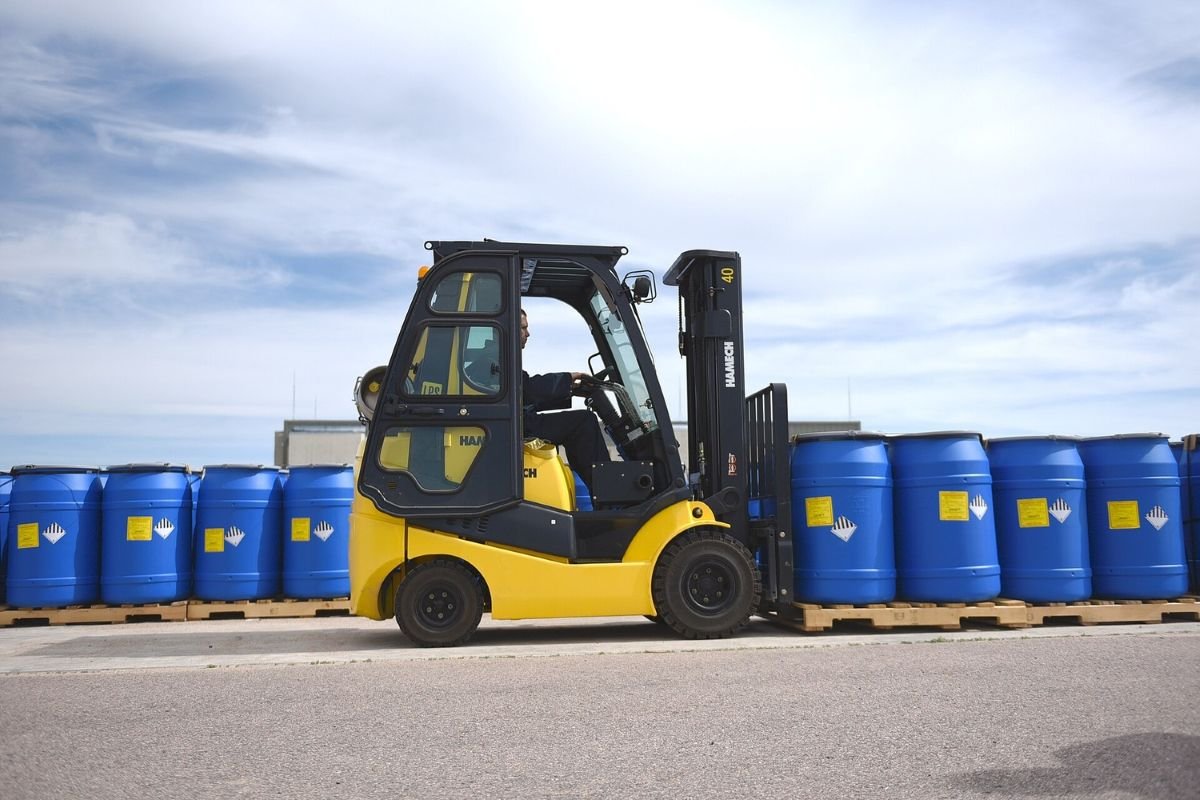 Industrial drums stored in rows as consumable inventory proxy