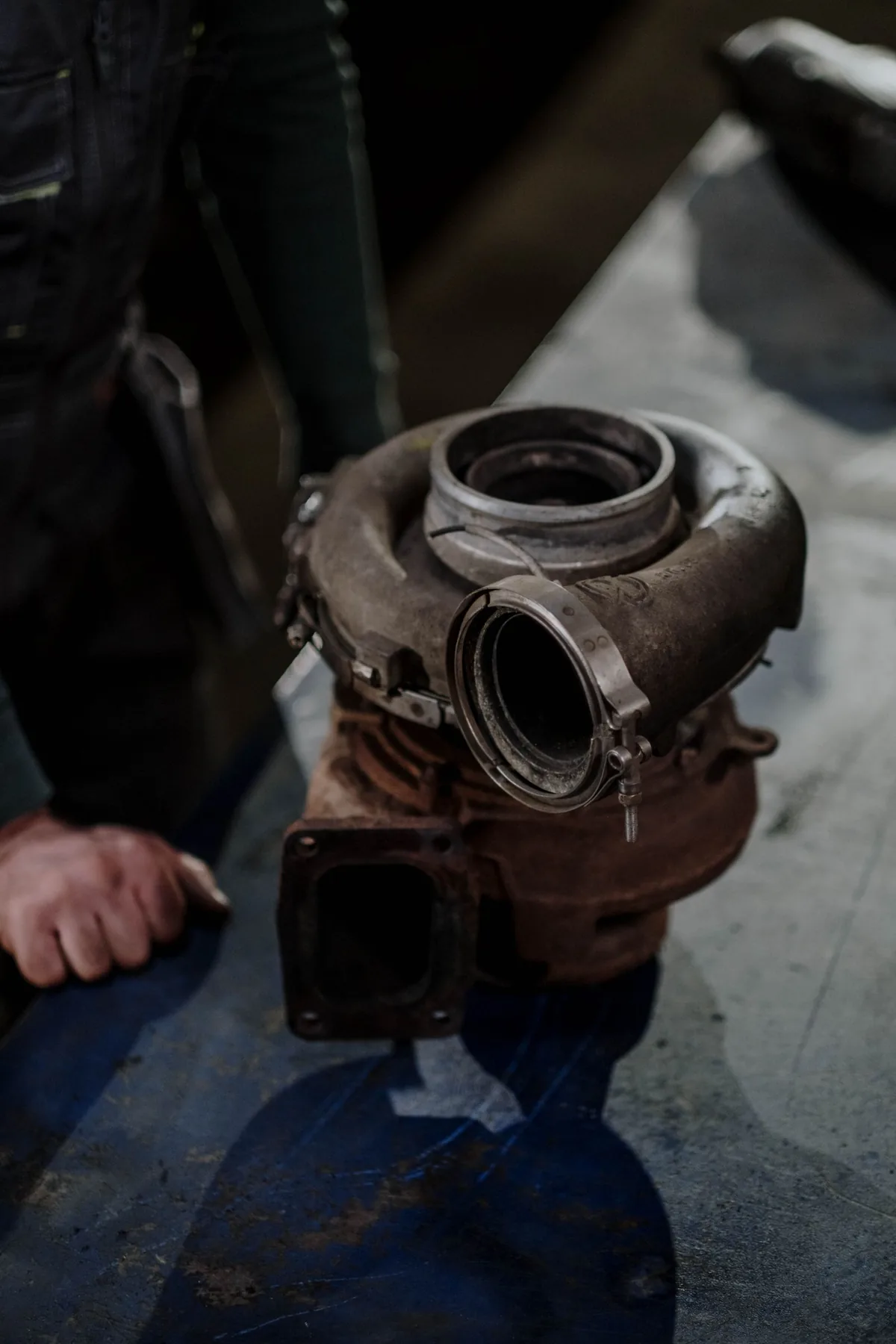 Turbocharger on a workshop bench representing an automotive service part