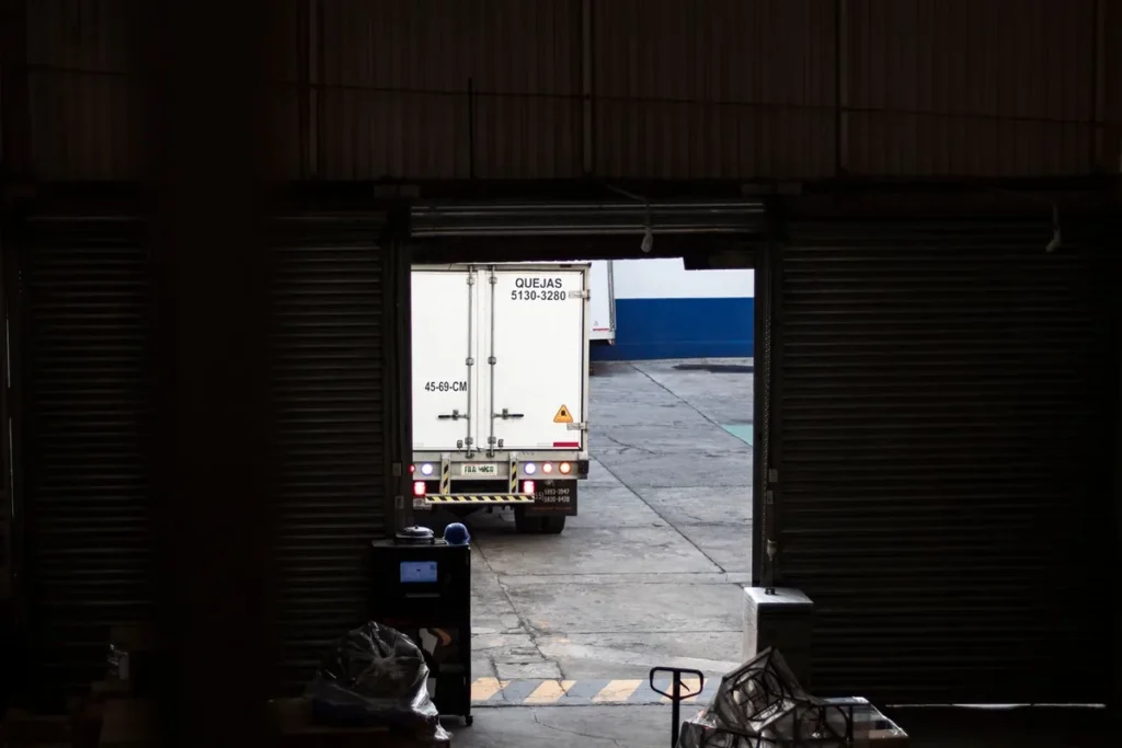 Loading dock logistics planning for industrial shrink wrapping equipment installation